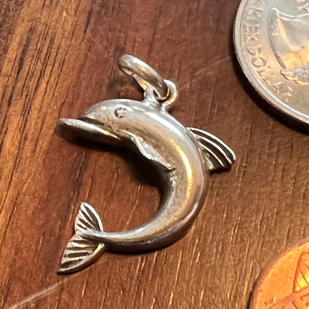 Vintage sterling silver dolphin pendant